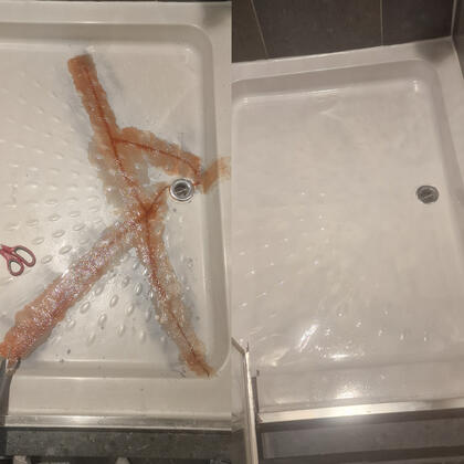 Before and after picture of acrylic shower tray crack repaired in reading