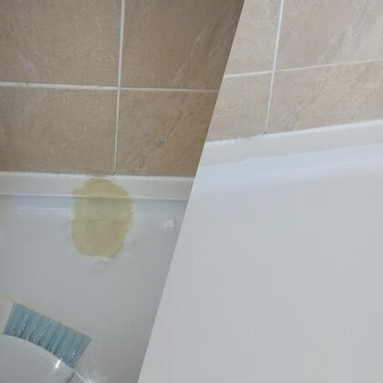 Before and after picture of acrylic shower tray crack repaired in reading